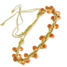Żółta bransoletka przyjaźni - lśniące pomarańczowe koraliki