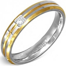 Srebrno-złoty pierścień ze stali z małym przeźroczystym kamyczkiem