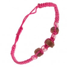 Różowa bransoletka sznurkowa - drewniane wałeczki i bezbarwne koraliki