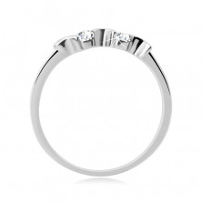 Srebrny pierścionek 925 - nieregularne księżyce, dwie okrągłe bezbarwne cyrkonie