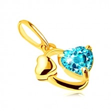 Złoty wisiorek 375 - zarys owalu, lśniące serduszko, serce z niebieskiego topazu