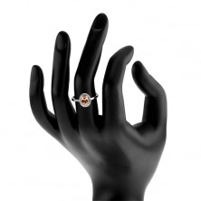 Srebrny pierścionek 925, pomarańczowa owalna cyrkonia, przezroczysta lśniąca obwódka