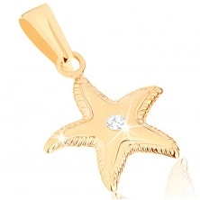 Złoty wisiorek 375 - lśniąca rozgwiazda, karbowane krawędzie, przezroczysta cyrkonia