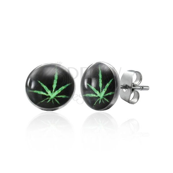 Stalowe kolczyki wkręty, zielona marihuana na czarnym tle