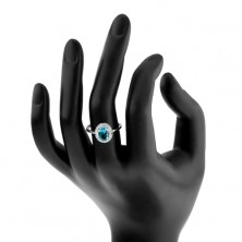 Rodowany pierścionek, srebro 925, jasnoniebieski cyrkoniowy owal, wycięcia