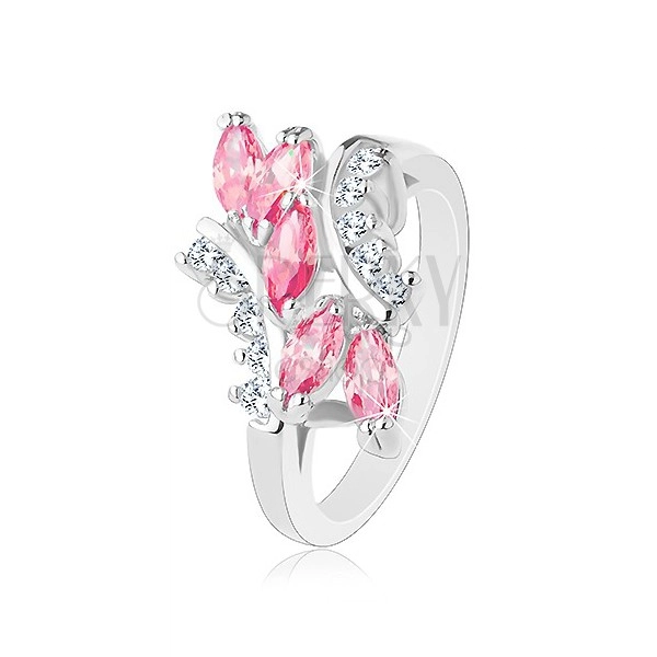 Lśniący pierścionek srebrnego koloru, różowe cyrkoniowe ziarenka, przezroczyste cyrkonie
