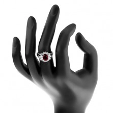 Lśniący pierścionek z rozdzielonymi ramionami, duża ciemnoczerwona cyrkonia, przezroczysta oprawa
