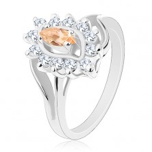 Błyszczący pierścionek w srebrnym odcieniu, pomarańczowe ziarenko, przezroczyste cyrkonie