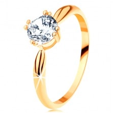 Złoty zaręczynowy pierścionek 585 - zaokrąglone ramiona, błyszcząca okrągła cyrkonia bezbarwnego koloru