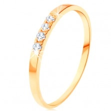Złoty pierścionek 585 - cienkie lśniące ramiona, linia czterech przezroczystych cyrkonii