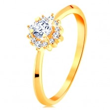 Złoty pierścionek 585 - błyszczący kwiatek z przezroczystych cyrkonii, cienkie lśniące ramiona