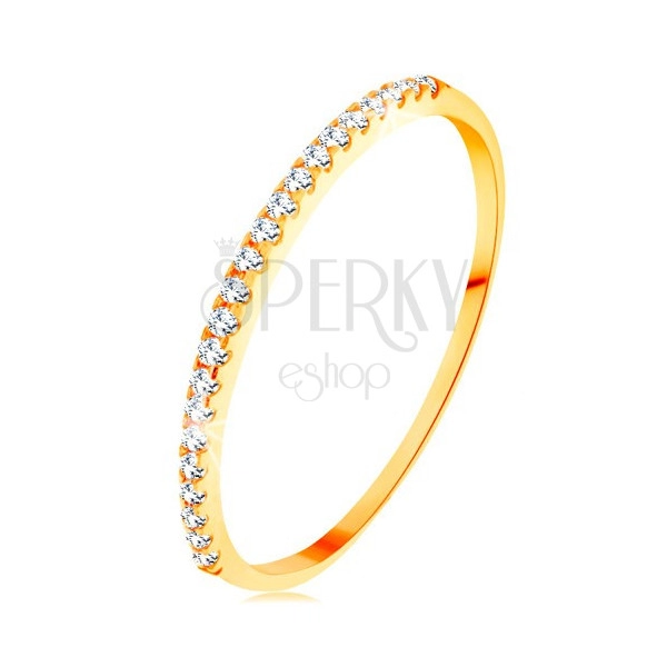 Złoty pierścionek 585 - cienkie lśniące ramiona, błyszcząca cyrkoniowa linia bezbarwnego koloru