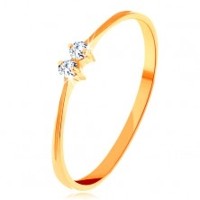 Złoty pierścionek 585 - cienkie lśniące ramiona, dwie połyskliwe cyrkonie bezbarwnego koloru