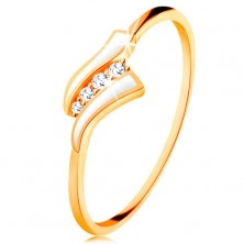 Złoty pierścionek 585 - dwie białe fale, pas przezroczystych cyrkonii, lśniące ramiona