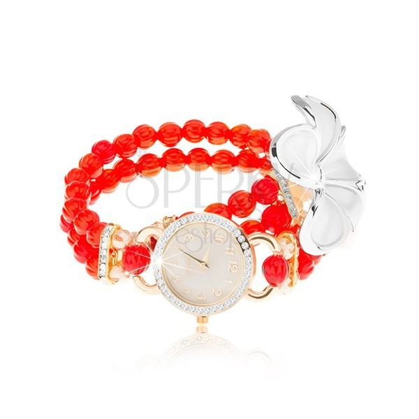 Zegarek analogowy, czerwona bransoletka z koralików, cyferblat z cyrkoniami, biały kwiat