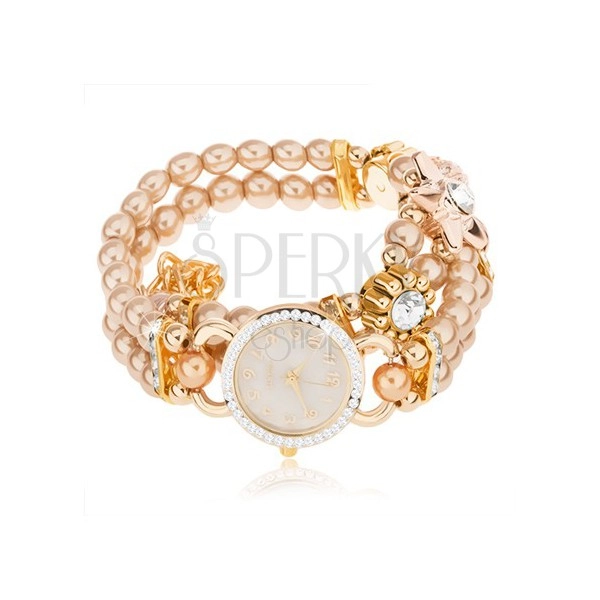 Zegarek na rękę, cyferblat z cyrkoniami, bransoletka z koralików złotego koloru, kwiaty
