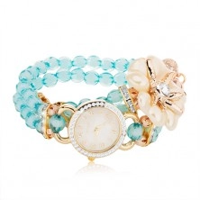 Zegarek na rękę z niebieskich koralików, cyferblat z cyrkoniami, biały kwiat