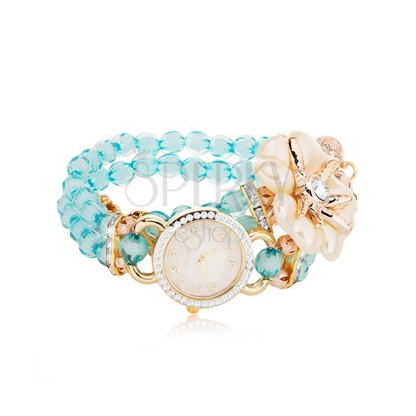 Zegarek na rękę z niebieskich koralików, cyferblat z cyrkoniami, biały kwiat