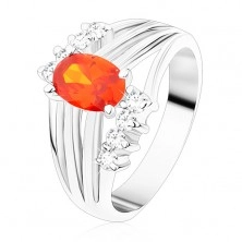 Błyszczący pierścionek srebrnego koloru, pomarańczowa owalna cyrkonia, lśniące pasy, bezbarwne cyrkonie