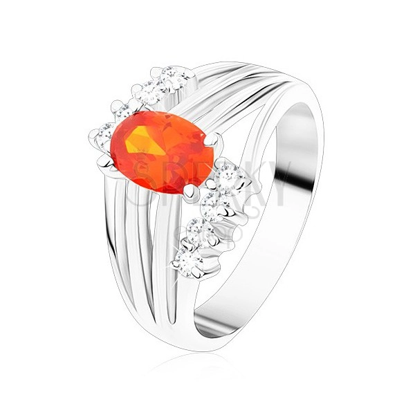 Błyszczący pierścionek srebrnego koloru, pomarańczowa owalna cyrkonia, lśniące pasy, bezbarwne cyrkonie