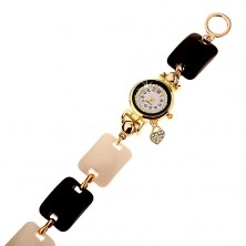 Czarno-biały zegarek na rękę, wypukłe prostokąty, cyferblat z bezbarwnymi cyrkoniami