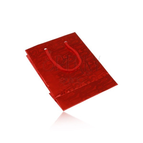 Mała czerwona torebka na upominek z abstrakcyjnym wzorem, czerwone sznurki