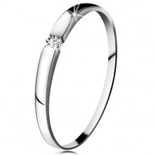 Diamentowy pierścionek z białego 14K złota - brylant bezbarwnego koloru, lekko wypukłe ramiona