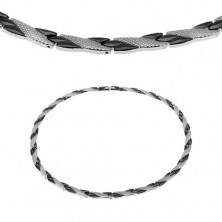 Stalowy naszyjnik, ukośne linie czarnego i srebrnego koloru, wzór skóry węża, magnesy
