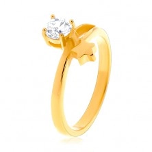 Stalowy pierścionek złotego koloru, gwiazda i okrągły bezbarwny cyrkon