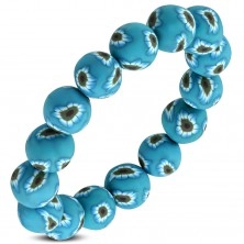 Elastyczna bransoletka FIMO, niebieskie koraliki z kwiatkami na gumce