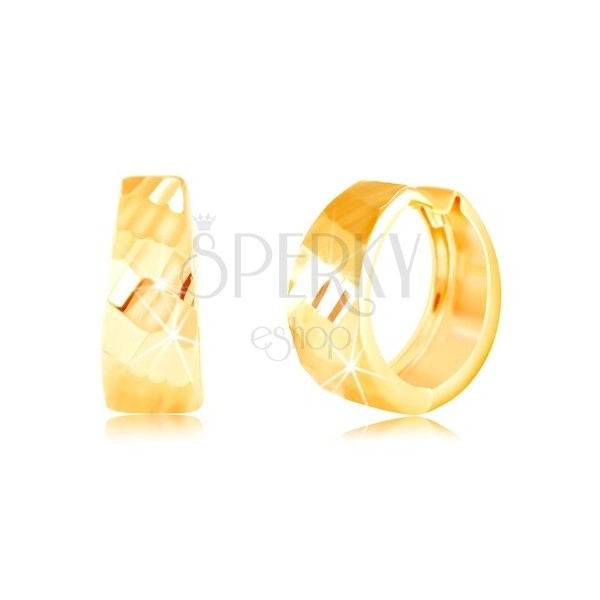 Złote kolczyki 585 - błyszczące rozszerzone koło, lśniąca szlifowana powierzchnia