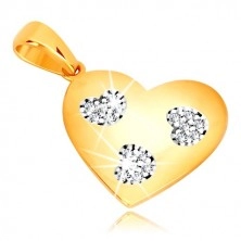 Zawieszka z żółtego złota 585 - symetryczne serce z cięciami w kształcie serca, cyrkonie