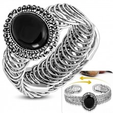 Elastyczna stalowa bransoletka - owalny ornament z czarnym kamieniem, spirala