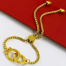 Stalowa bransoletka w złotym kolorze - kwadratowe elementy, kajdanki