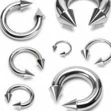 Piercing ze stali 316L - błyszcząca podkowa z kolcami, kolor srebrny, grubość 4 mm