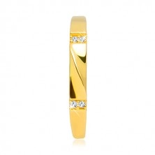Złoty pierścionek 585 - przezroczyste cyrkonie, lśniąca fala, gładkie ramiona