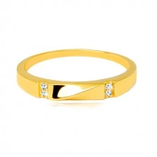 Złoty pierścionek 585 - przezroczyste cyrkonie, lśniąca fala, gładkie ramiona