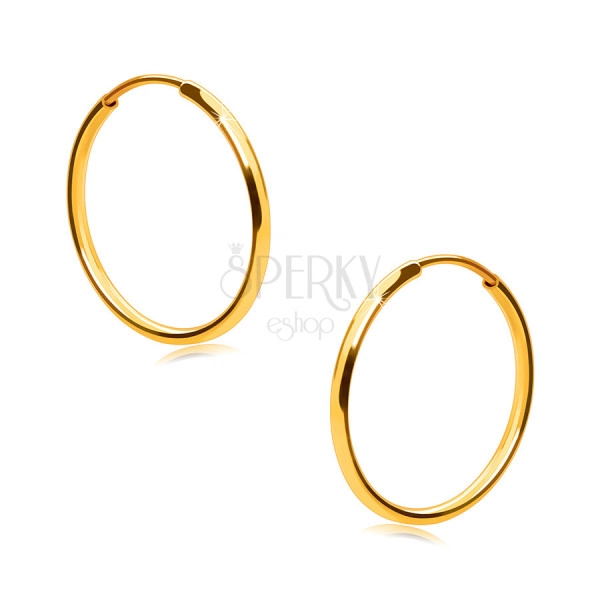 Złote okrągłe kolczyki z 14K złota - cienkie okrągłe ramiona, gładka i lśniąca powierzchnia, 15 mm